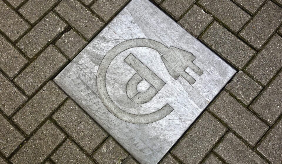 tile, street, car wallpapers, pavement, sidewalk, stone, symbol, icon, power plug, loading, car, power point, electric car, brown car, brown street, brown power